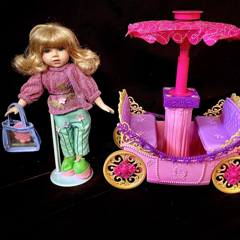 Doll with stand, chariot, purse, and mirror accessories